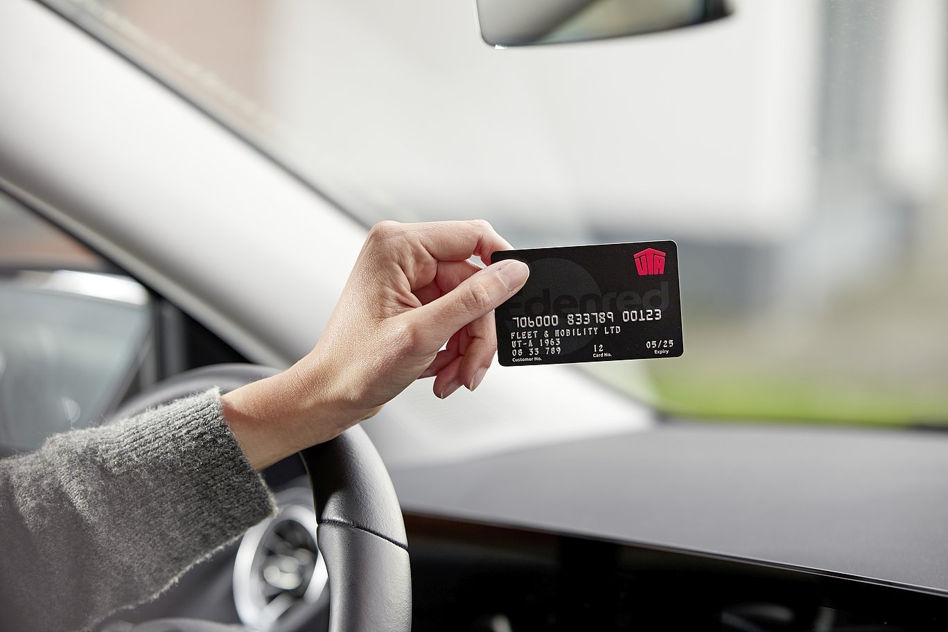 fuel-card-car-cockpit-hand-person